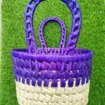 This image shows a top view of our purple woven basket, helping shoppers see the detailed craftsmanship and internal space of the product.